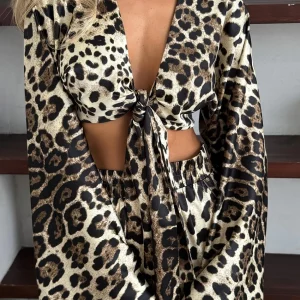 Leopard Print 2-Piece Women's Outfit: Sexy Lace-Up Crop Top & Slit Pants