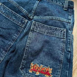 Vintage Blue Baggy Jeans with Monogram Embroidery